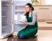 Young,Woman,Cleaning,Fridge,In,Hygiene,Concept