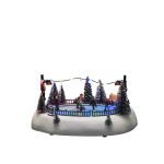 Konstsmide LED Szenerie Eisbahn mit Musik 12 bunte LEDs Batterie USB